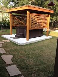 Another good idea for areas that are not prone to extreme weather is just to build a simple, wooden bench going around all of the hot tub or around all but one side for easier entry. How To Create Your Ideal Outdoor Or Indoor Hot Tub Enclosure Caldera Spas