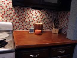 This will ensure everything stays put and even while the adhesive dries. Installing A Tile Backsplash In Your Kitchen Hgtv