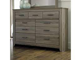 Get 5% in rewards with club o! Signature Design By Ashley Zelen Rustic Tall Dresser With 7 Drawers Royal Furniture Dressers