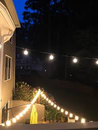 adding patio string lights to the deck