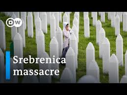 Bosnian muslim woman touches the freshly dug grave of her father, a victim of srebrenica genocide on july 11, 2020 at the cemetery in potocari near. Bosnians Mark 25th Anniversary Of Srebrenica Massacre Dw News Youtube