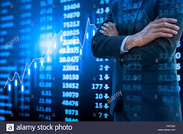 Smart Businessman Arms Crossed And Stock Market Chart