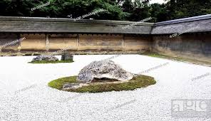 a zen rock garden in ryoanji temple in