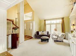 golden living room with beige carpet