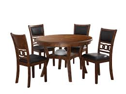 The bixby dining room evokes a traditional feel with nailhead trim seat cushions, shaped legs, and wheat back chair. New Classic Furniture Gia Round Dining Set 47 Brown Buy Online In Andorra At Andorra Desertcart Com Productid 73747338