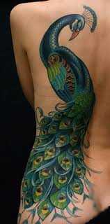 The natural look of the phoenix a body tattoo while other body tattoo shows the treasures. 55 Peacock Tattoo Designs Cuded