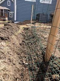 The openings in the wire mesh are smaller at the bottom to protect from rabbits and other small critters while larger holes at the top keep larger nuisance animals out of your garden. Quick And Easy Rabbit Fencing To Protect The Garden Taylor Callsen