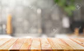 Sanding lighter or harder or using different grits will change the look of any finish you apply. Wood Table Top On Blur Kitchen Counter Background For Montage Stock Photo Picture And Royalty Free Image Image 158328459