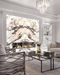 Backlit Bookmatched Marble Fireplace