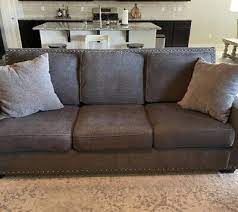Ashley Furniture Gray Studded Sofa Set