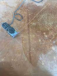 neglected stained concrete floor