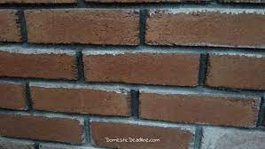 whitewash brick fireplace wall