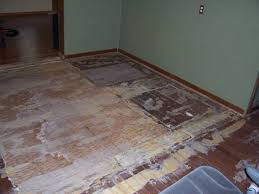 A carpet directly glued down has several bubbles and underneath is a white powder substance. Flooring Under Carpet Diy Home Improvement Forum