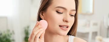 using makeup sponge and makeup puff