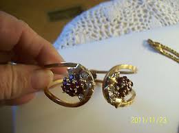 red rhinestone necklace earrings brooch