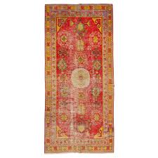 red antique handmade khotan wool rug