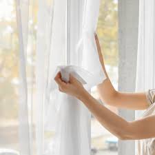 get wrinkles out of new curtains