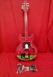 cd player with radio guitar shaped