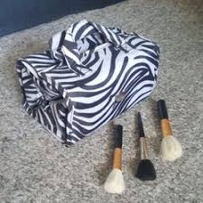 new and used makeup brushes in