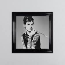 Audrey Hepburn With Framed Wall