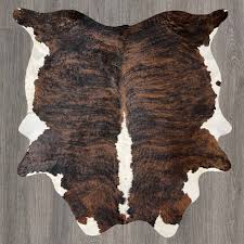 dark brown tricolor brindle cowhide rug