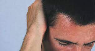 headache behind the ear causes