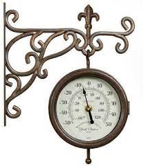 york station wall clock and thermometer