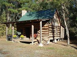 historic log cabin on 21 acres in north