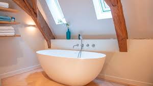 bathroom with a sloping roof design