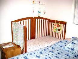 turn queen bed into crib