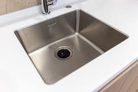 a garbage disposal with standing water