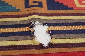 dog chewed into my area rug
