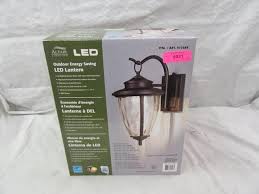 Altair Lighting Outdoor Energy Saving Oil Rubbed Bronze Finish With Clear Hammered Glass Led Lantern Model Al 2161 Auction Auction Nation