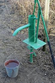 Hand Pump Leading Artesian Well Pumping