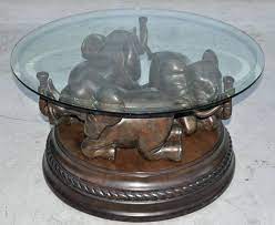 coffee table with 3 elephant sculpture