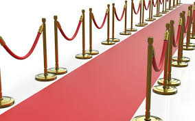 red carpet with metallic pylons