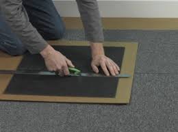 laying carpet tiles