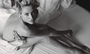 Charlize Theron, 40, strips off her clothes to pose naked in bed for W  magazine while talking Mad Max | Daily Mail Online