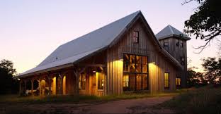 this country barn home has a 24 foot center