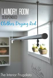 Most drapery rods and track will have ceiling mount brackets available. Diy Suspended Clothes Drying Rod Interior Frugalista