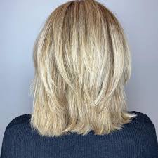 'medium length hairstyles look great when they're maintained well; 50 Best Medium Length Layered Haircuts In 2021 Hair Adviser