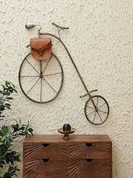 Brown Metal Ancient Cycle With Bag Wall