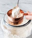 How do you measure flour with a table spoon?