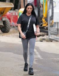 Katie price offers to adopt little girl, 2, with cleft lip who is facing life in care; Katie Price In A Black Tee Arrives For A Business Meeting In Essex 06 16 2020 Lacelebs Co