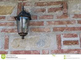 Exterior Light Fixture Mounted On Brick Wall With Copy Space