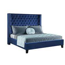 navy blue velvet queen bed with slatted