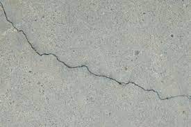 how to repair wide s in concrete