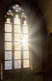 church stained glass window with light