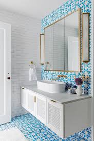 blue mosaic tiles with oval vessel sink