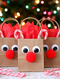 You can always add a piece of cardboard to the bottom of the bag to make it more sturdy. Reindeer Gift Bags Happy Go Lucky